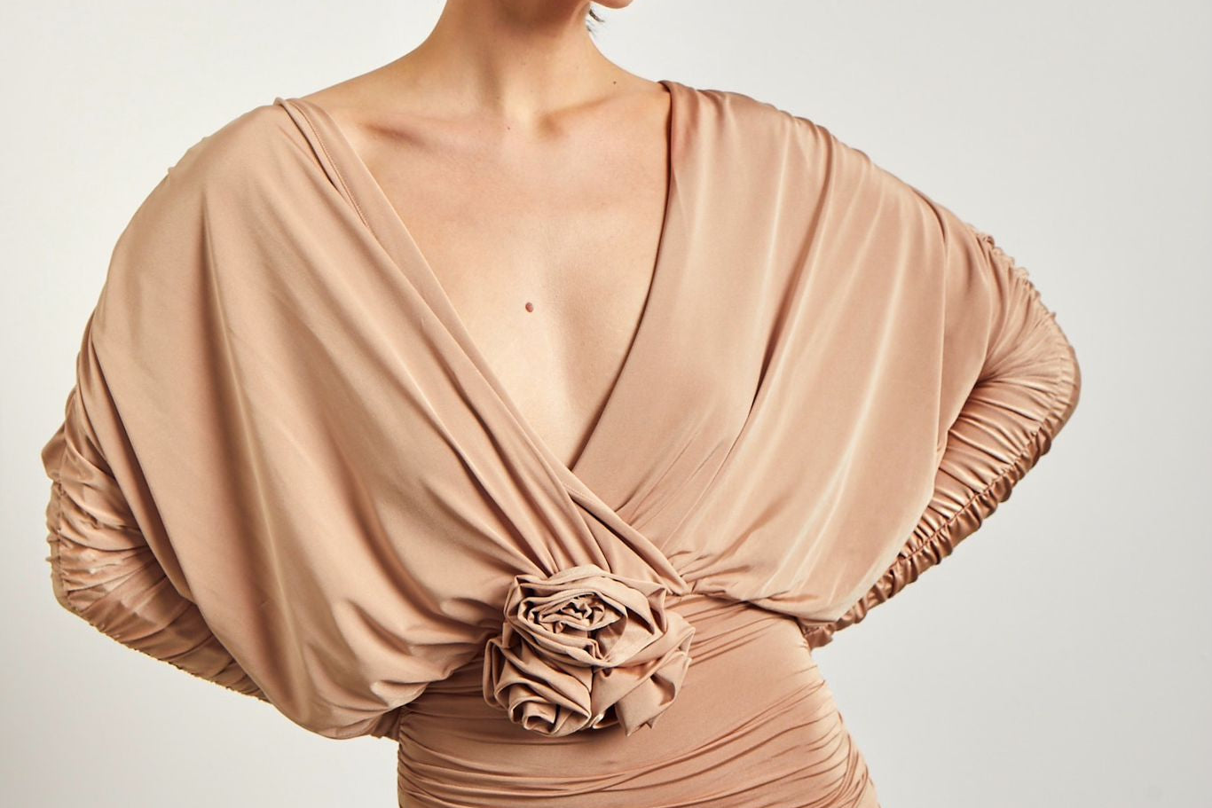 Warm beige color draped mini dress with a V-neckline jeanetteonline Warm beige color draped mini dress with a V-neckline jeanetteonline